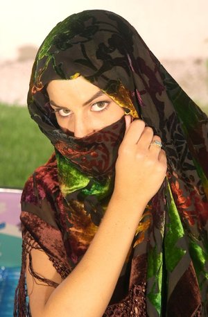 18 year old female Chloe Dash undressing on yoga mat on lawn